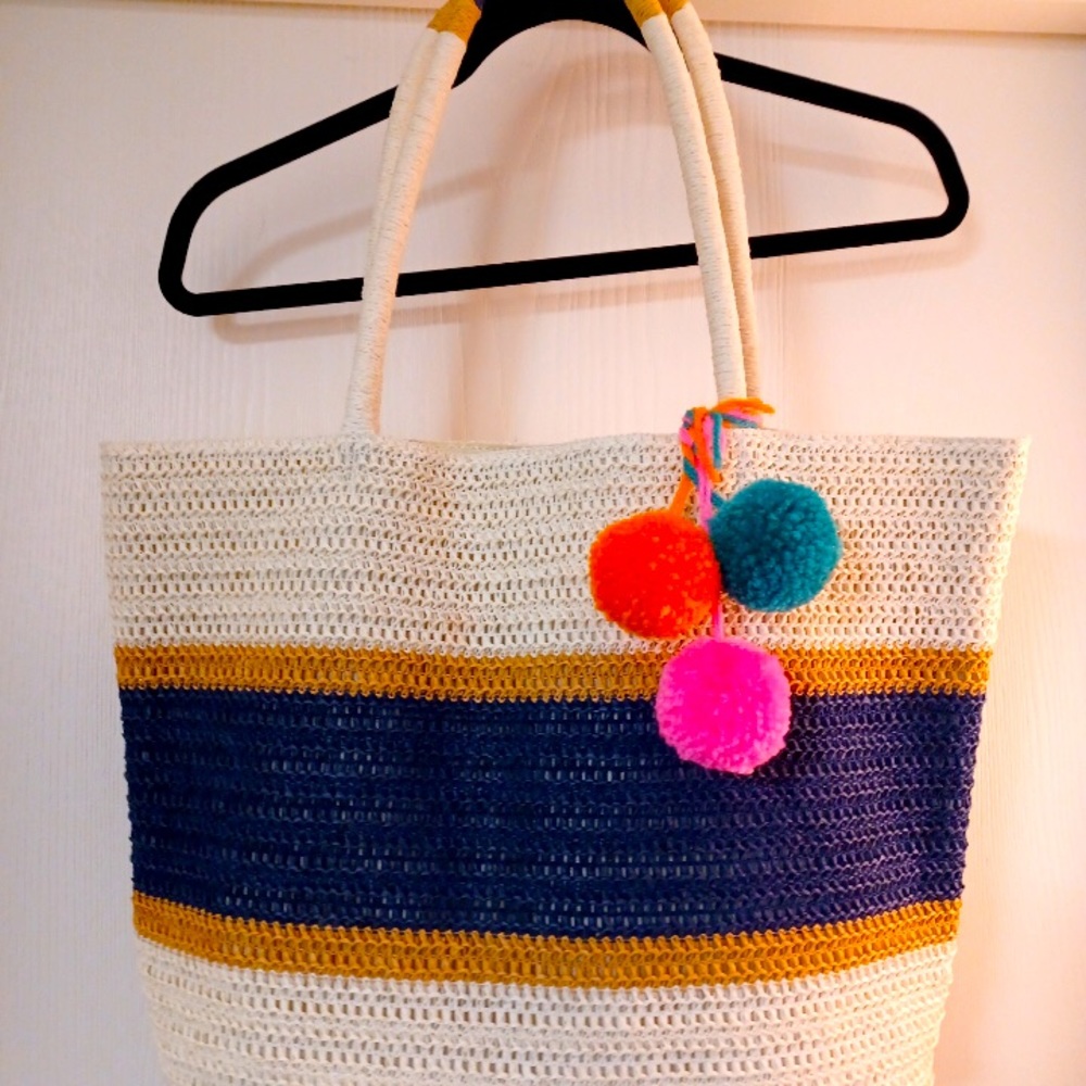 Straw purse with Pom poms